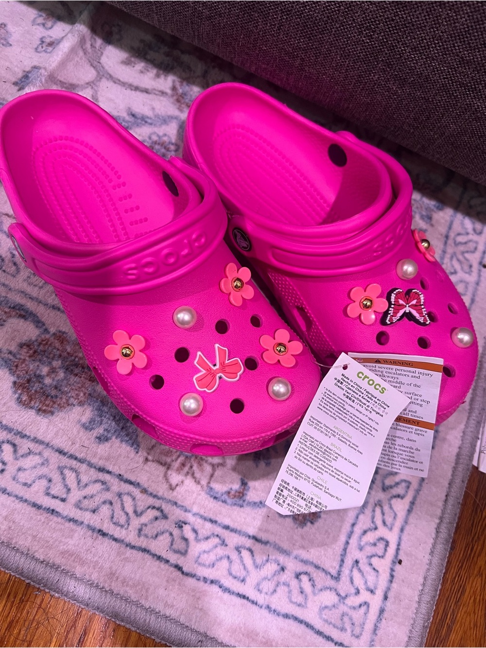 CROCS Kids' Classic Clog in Hot Pink with Charms